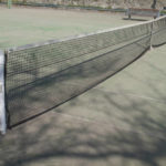 Comment un constructeur de court de tennis en béton poreux à Paris peut-il améliorer l’esthétique de votre installation sportive ?